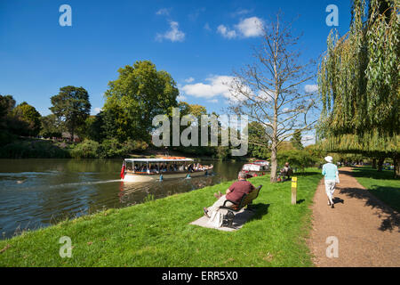 Boats beside River Avon, willows, banks, walking, Stratford upon Avon,  Warwickshire, UK Stock Photo