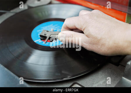 DJ hand on the turntable Stock Photo
