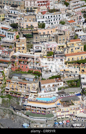 AERIAL VIEW. Vacation rentals on a very steep slope. Positano, Amalfi Coast, Province of Salerno, Campania, Italy. Stock Photo