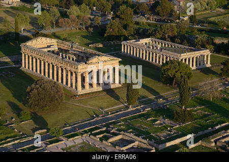 AERIAL VIEW. Greek temples of Hera II or Neptune(left) and Hera (right). Paestum, Province of Salerno, Campania, Italy. Stock Photo