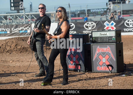 June 6, 2015 - Metallica guitarists, JAMES HETFIELD (left) and KIRK HAMMETT (right) perform the National Anthem to kick off the motocross event at 2015 X Games, Circuit Of The Americas, Austin, Texas © Sandy Carson/ZUMA Wire/Alamy Live News Stock Photo