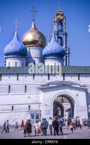 June 10, 1989 - Sergiyev Posad, Moscow Oblast, Russia - The Assumption Gate to the ancient Trinity Monastery of St. Sergius. Rising above it are the onion domes of the Dormition Cathedral (Cathedral of the Assumption) and the Bell Tower. The Trinity Lavra (monastery) of St. Sergius is the most important Russian monastery-fortress and the spiritual center of the Russian Orthodox Church. Founded in the 14th century by St Sergius of Radonezh, one of the Church's most highly venerated saints, it is 70 km (44 mi.) north-east from Moscow. A UNESCO World Heritage Site it is visited by many thousan Stock Photo