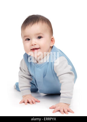 Portrait of a smiling happy seven month old baby boy crawling isolated on white background. Stock Photo