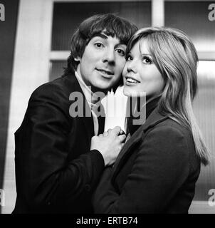 Keith Moon, drummer of British rock group The Who, pictured with his wife Kim. 24th March 1969. Stock Photo