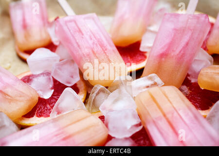 Fruity popsicles with ice and bloodorange Stock Photo