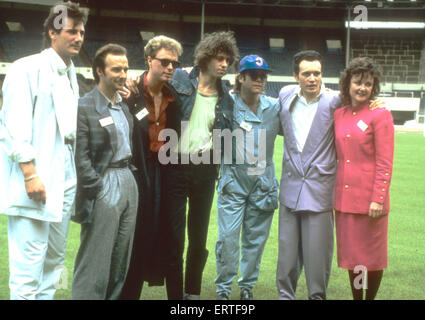 LIVE AID Wembley Stadium 13 July 1985. From left: Tony Hadley, Midge Ure, unknown, Bob Geldof, Elton John, Adam Ant,unknown Stock Photo