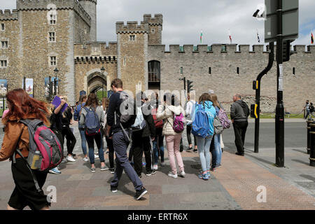 A group of foreign students going to visit Cardiff Castle in Wales UK  KATHY DEWITT Stock Photo