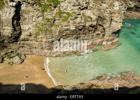 The beach at Bossiney Haven Cove and in the sea near Tintagel, Cornwall, England, UK Stock Photo