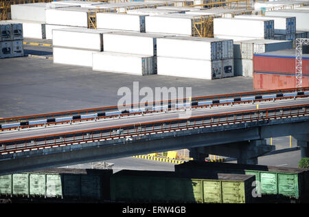 Port warehouse with containers and industrial cargoes Stock Photo