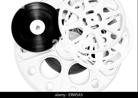 Different movie film reels, black and white isolated on white background Stock Photo