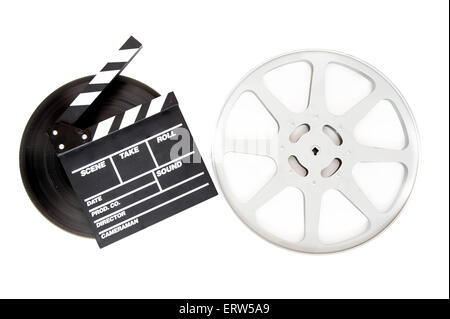 Movie clapper on 35 mm cinema film reels isolated on white background Stock Photo