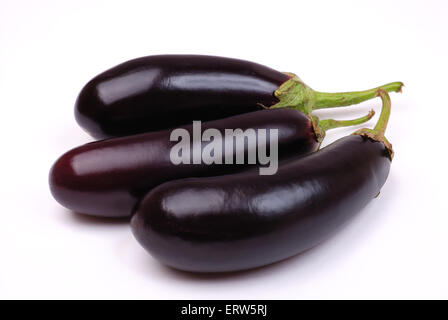 Three whole eggplants on a white background Stock Photo