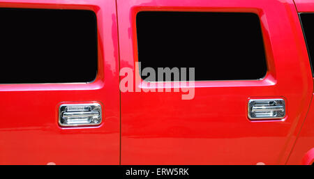 Doors and windows of the red limousine Stock Photo