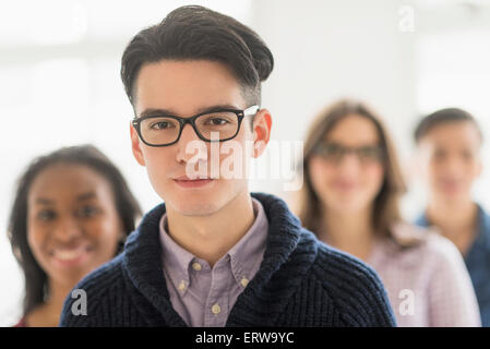 Close up of smiling businessman in office Stock Photo