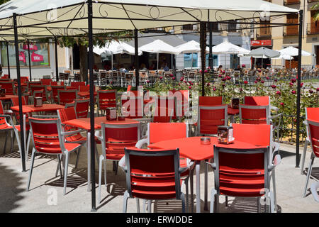 Empty tables and chairs in outdoor restaurant, Illescas, Spain Stock Photo