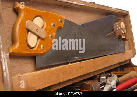 Vintage handmade wooden toolbox with carpentry tools Stock Photo
