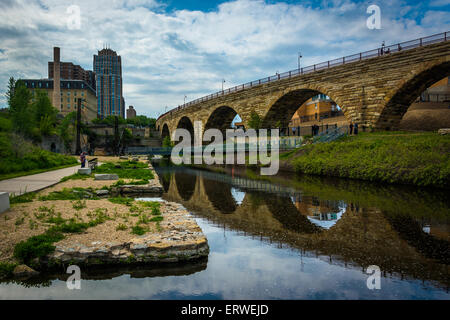 The Stone Arch Bridge and Mill Ruins Park, in Minneapolis, Minnesota. Stock Photo