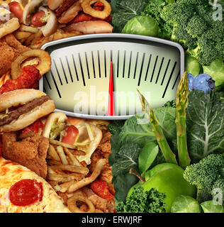 Dieting choice weight scale with unhealthy junk food on one side and healthy fruit and vegetables on the other half as a fitness and nutrition eating decision symbol. Stock Photo