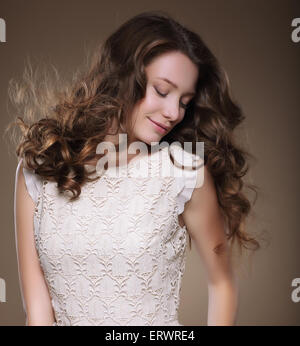 Pure Beauty. Young Brunette with Closed Eyes Stock Photo