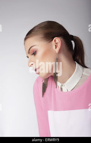 Sentimental Dreamy Woman in Pink Blouse Stock Photo