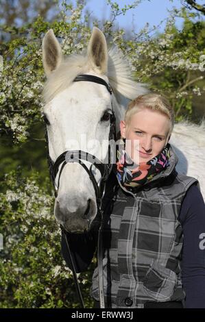 woman with Hanoverian horse Stock Photo