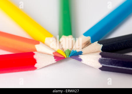 Red, Orange, Yellow, Green and blue pencils in a semi-circle Stock Photo