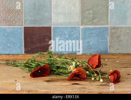 wild flowers on a wooden table Stock Photo