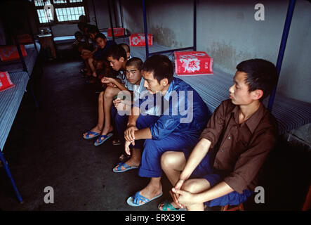 Chinese youth prisoners in Chengdu Youth Detention Center dormitory, 1980s Stock Photo