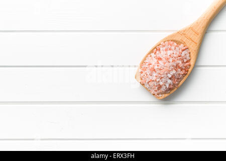 Himalayan salt on wooden spoon Stock Photo