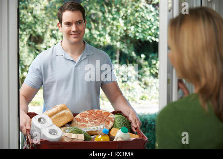 Driver Delivering Online Grocery Order Stock Photo