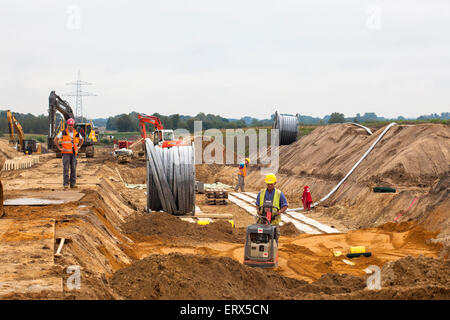 Germany, Raesfeld, installation of a 380 kV high-voltage underground line Stock Photo