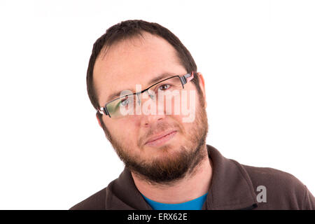 portrait of handsome young man wearing glasses against white background Stock Photo
