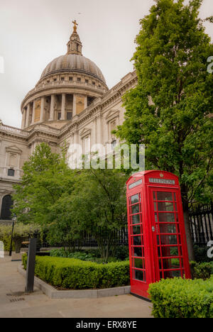 Traditional red telephone box outside St Paul's Cathedral, London, UK. Stock Photo