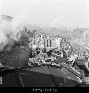 The Harrow and Wealdstone rail crash was a three train collision at Harrow and Wealdstone station, in London, at 8:19 am on 8 October 1952. An express train from Perth, Scotland collided at speed into the rear of the Tring to Euston local service passenger train that had stopped at the station; within a few seconds of this collision the Euston to Liverpool express train, travelling at speed in the opposite direction, crashed into the Perth train's locomotive. It was the worst peacetime rail crash in the United Kingdom there were 112 fatalities. Stock Photo