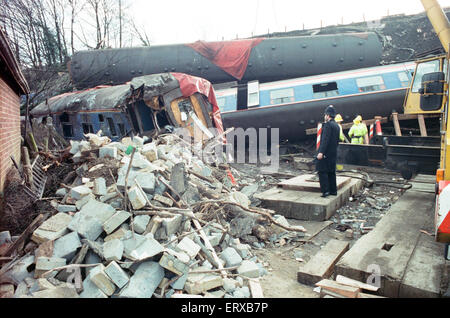 Purley  train crash On 4 March 1989 the 12:50 from Horsham stopped at Purley railway station. As it left the station, it crossed from the slow line to the fast line as scheduled and at 13:39 was struck from behind by the following 12:17 from Littlehampton Stock Photo