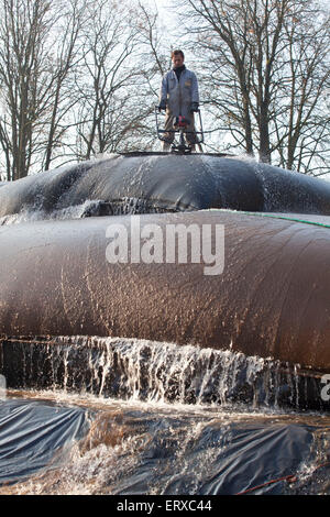 Germany, Iserlohn, sludge dewatering using geotextile tubes, Geotubes Stock Photo