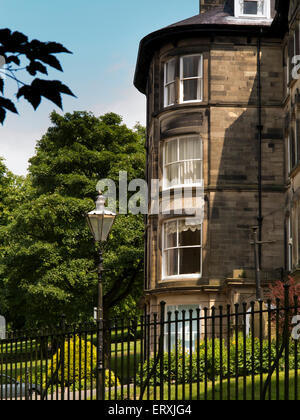 UK, England, Derbyshire, Buxton, Broad Walk, elegant stone built four storey house beside Pavilion Gardens Stock Photo