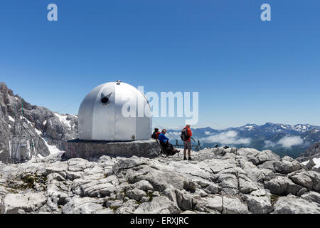 Hikers Taking a Break at the Cabana Veronica in the Picos de Europa Mountains, Cordillera Cantabrica Spain Stock Photo