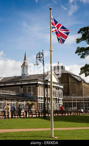 UK, England, Derbyshire, Buxton, Pavilion Gardens, Union Jack flag flying outside the Pavilion Stock Photo