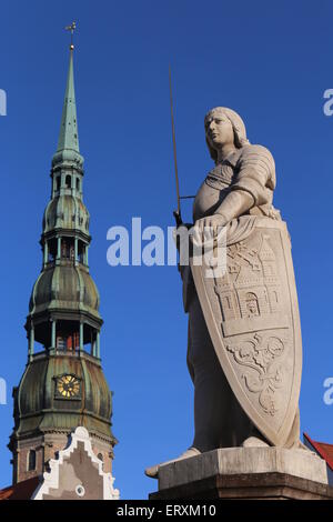 Statue of Roland.On background St Peter church.Town Hall square,Riga,Latvia,Europe Stock Photo