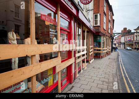 Shops boarded up in advance of the Royal Shrovetide Football Match, Ashbourne, Derbyshire, England UK GB EU Europe Stock Photo