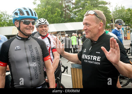 Lygby, Denmark. 9th June, 2015.  Danish oppsition leader, Lars Loekke Raasmussen (Venstre, read: The Liberal's) (R), is on a biking tour together with 170 other in Lyngby bear Copenhagen. Here Mr. Rassmussen spoke to freinds among the bikers before the race started Credit:  OJPHOTOS/Alamy Live News Stock Photo
