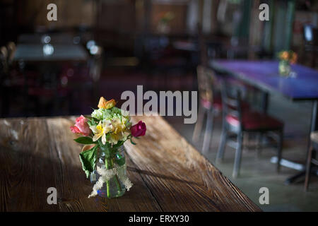 Clarksdale, Mississippi - Flowers on a table at the Shack Up Inn on the Hopson Plantation. Stock Photo