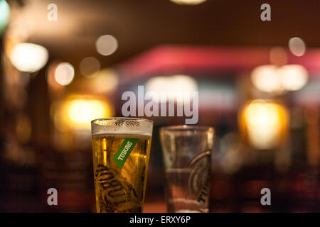 Two pints of tuborg beer in a pub Stock Photo
