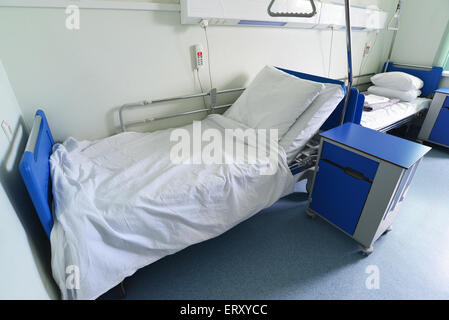 Hospital beds in a private hospital ward Stock Photo