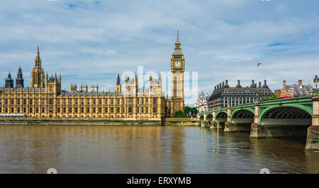 Palace of Westminster with Elizabeth Tower and Westminster Bridge, viewed from across the River Thames. Stock Photo