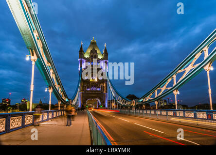 Bridge Tower night view from the bridge, London United Kingdom. A combined bascule and suspension bridge which crosses the River Stock Photo