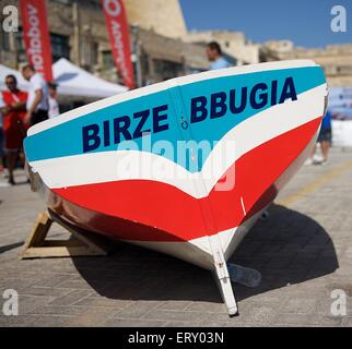 VALLETTA, MALTA - SEPTEMBER 8: fragment photo of traditional boats regatta in Valletta in Mediterranean sea  on Sep 8, 2013. Stock Photo