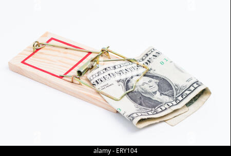 Image shows a mousetrap with a dollar bill on white background Stock Photo