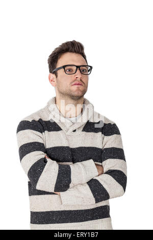 Portrait of a handsome young man with glasses wearing a sweater,isolated against a white background. Stock Photo